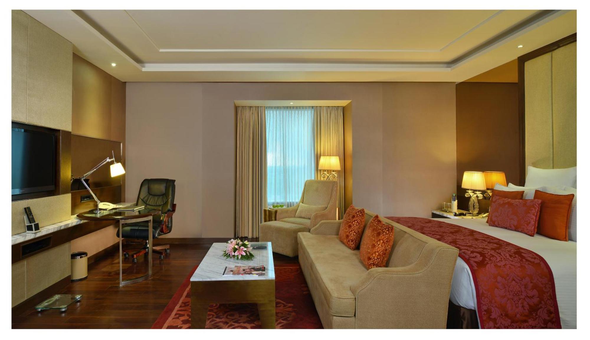 Junior Suite with Bathtub Non Smoking Room with 02 beer or 02 Pegs(IMFL) or 02 Mocktails and 02 pcs laundry, Complimentary INR 500 Hotel Credit on min usage of INR 2000 at market place restaurant on Food & Soft Beverages, 50% off on Mini Bar
